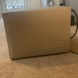 This is a sharp microwave. 1000 watts. Bought in 2021